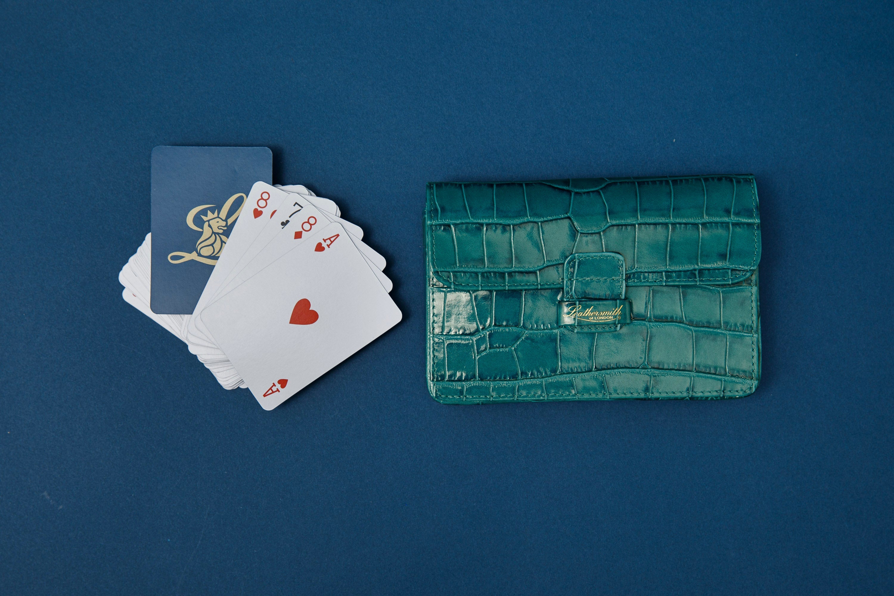 Leathersmith of London branded playing cards with ace of spades design and navy presentation box
