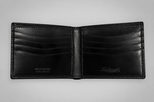 Interior of black bridle leather wallet showing eight card slots