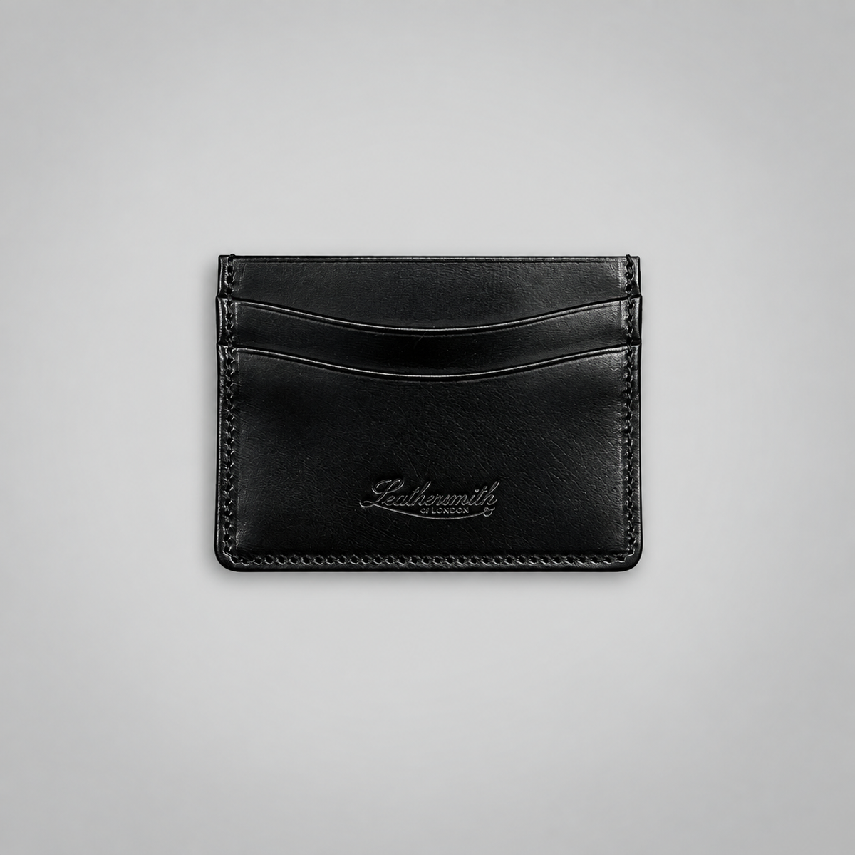 Black bridle leather double-sided cardholder by Leathersmith of London