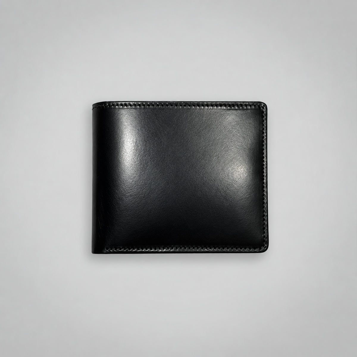 Black bridle leather eight card bifold wallet by Leathersmith of London