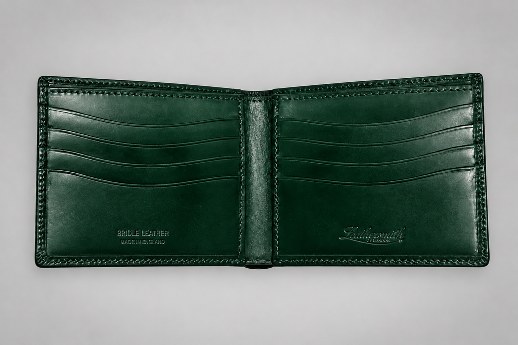 Open bottle green bridle leather wallet showing card compartments