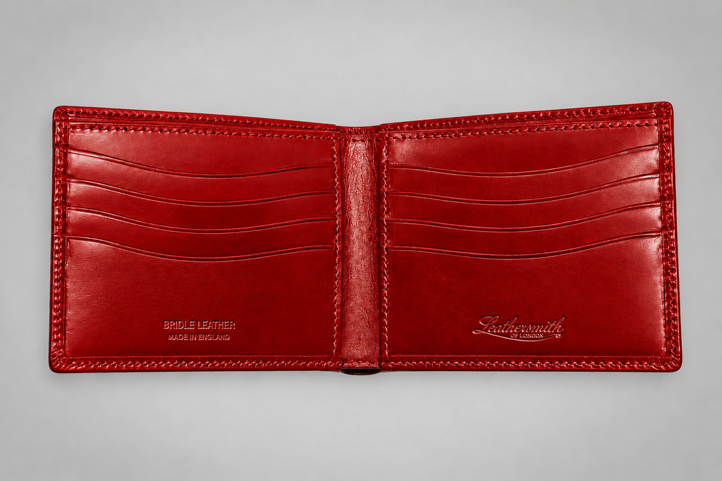 Open red bridle leather bifold wallet with eight card slots