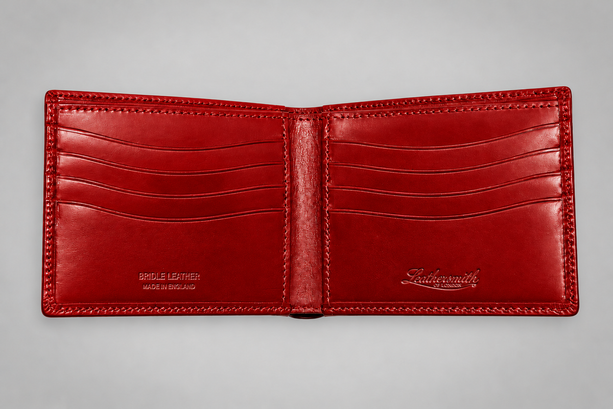 Open red bridle leather bifold wallet with eight card slots