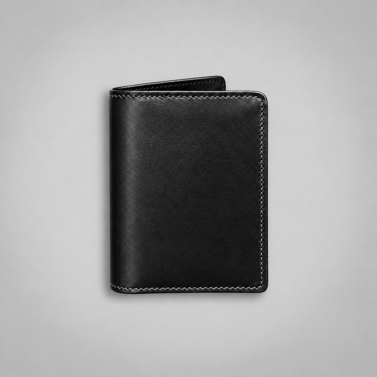 Black bridle leather two-gusset business card case by Leathersmith