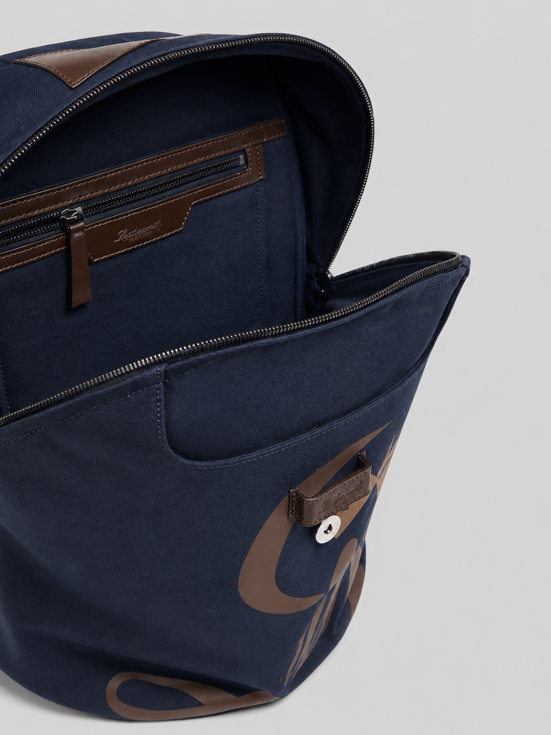 BKEMB | Embroidered Canvas Lion Backpack