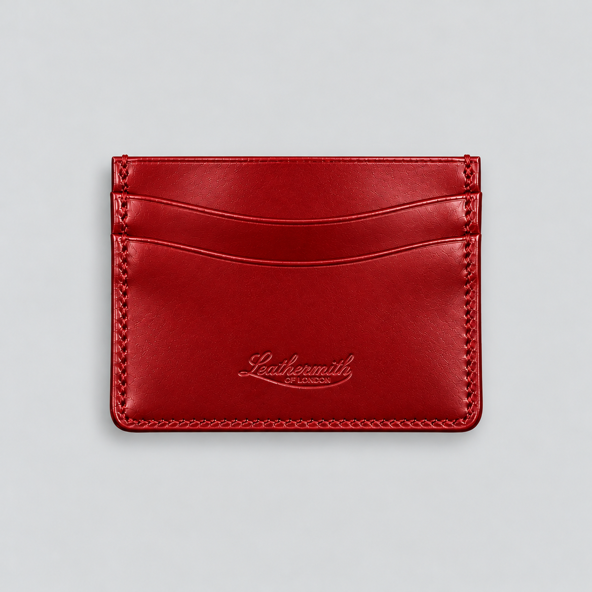 Red bridle leather double-sided cardholder by Leathersmith of London